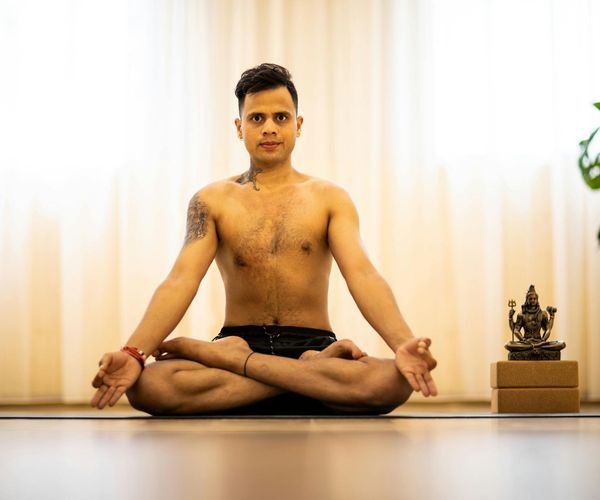 Man meditating after a workout, showing focus and inner peace.